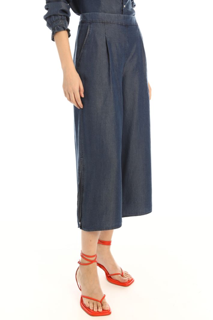 Jeans in denim con spacchi Fashion Market Jeans in denim con spacchi Fashion Market