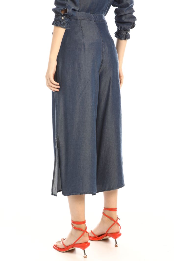 Jeans in denim con spacchi Fashion Market Jeans in denim con spacchi Fashion Market