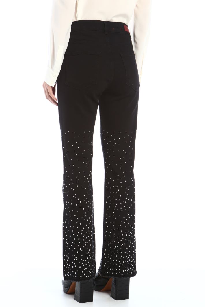 Jeans flare con borchie Fashion Market Jeans flare con borchie Fashion Market