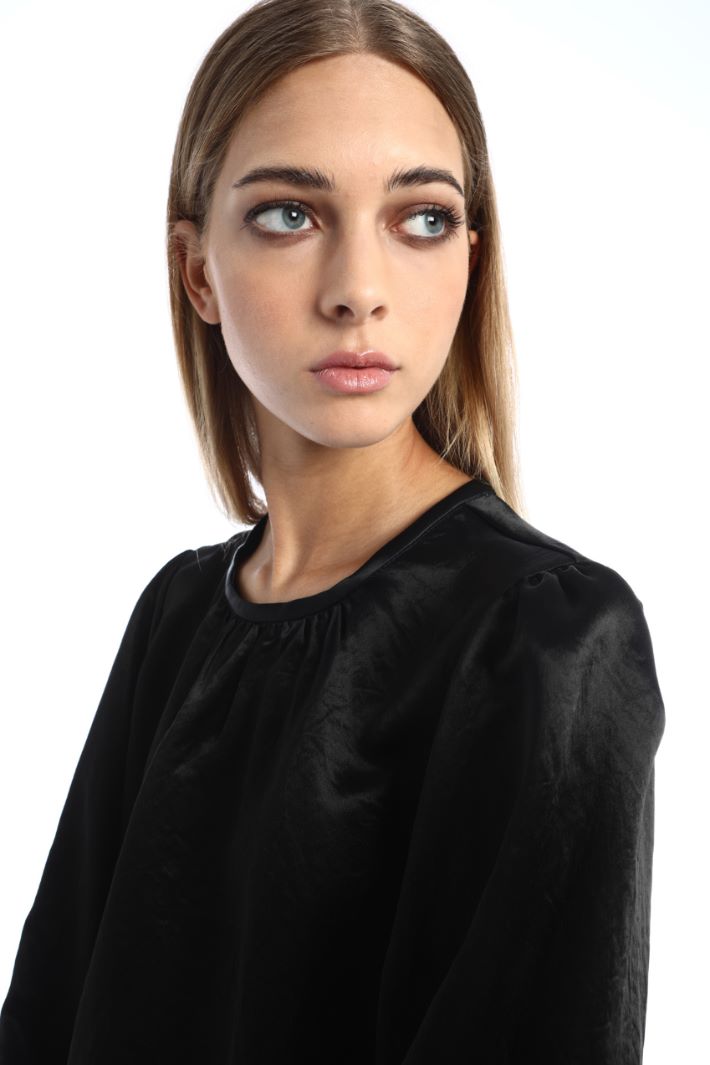 Blusa dal finish metallizzato Fashion Market
