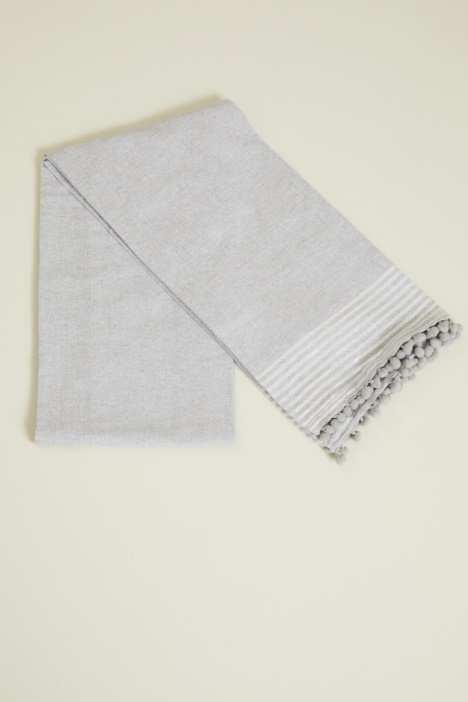 Telo mare rigato con dettaglio pon pon Fashion Market