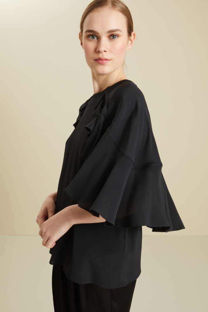 Blusa con volant Fashion Market