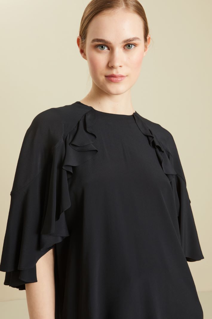 Blusa con volant Fashion Market