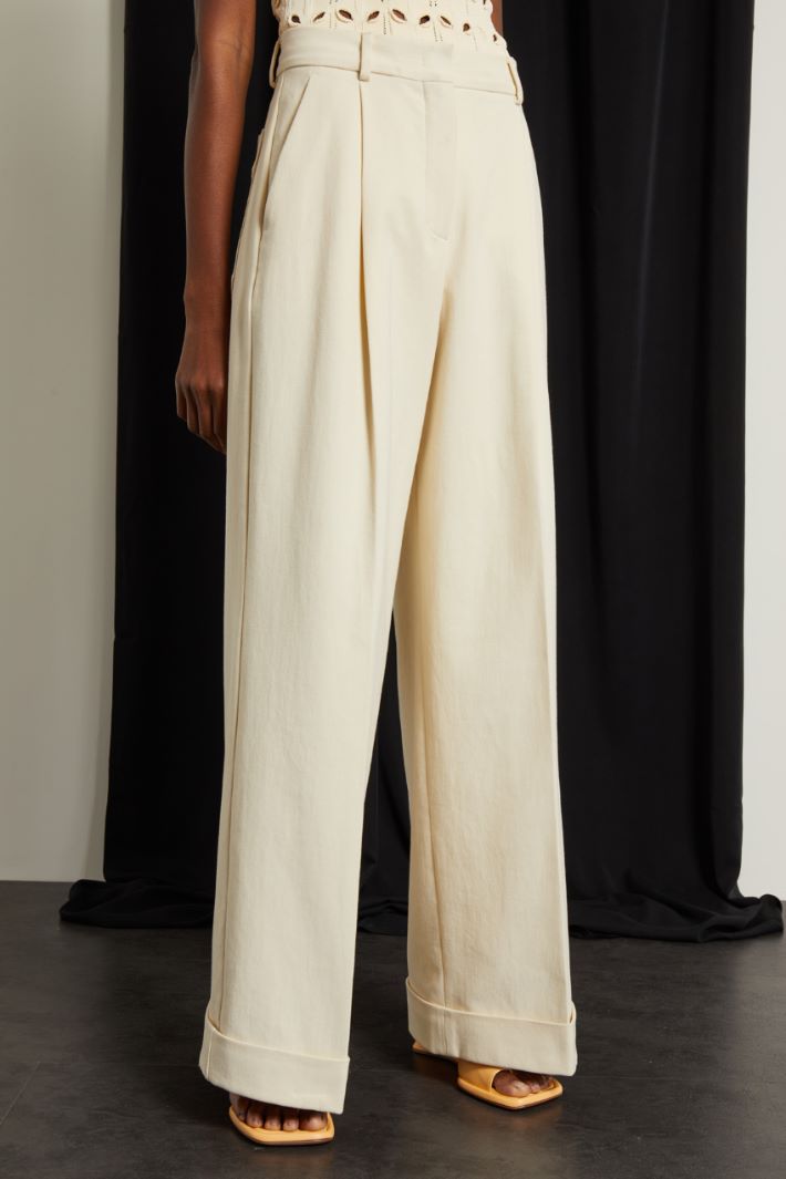 Pantaloni a zampa in crépe Fashion Market