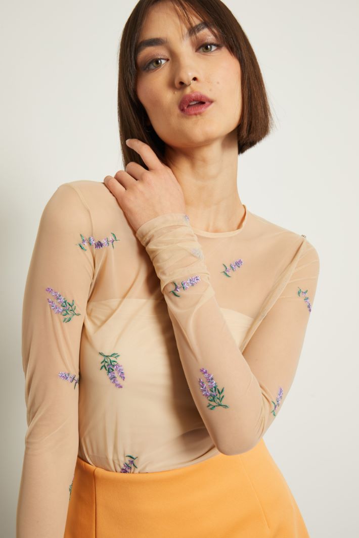 Top trasparente con ricami Fashion Market
