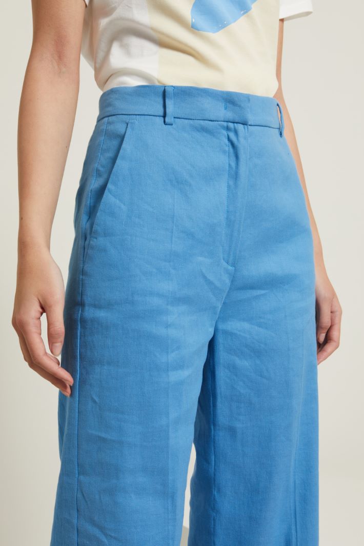 Pantaloni a zampa con piega Fashion Market