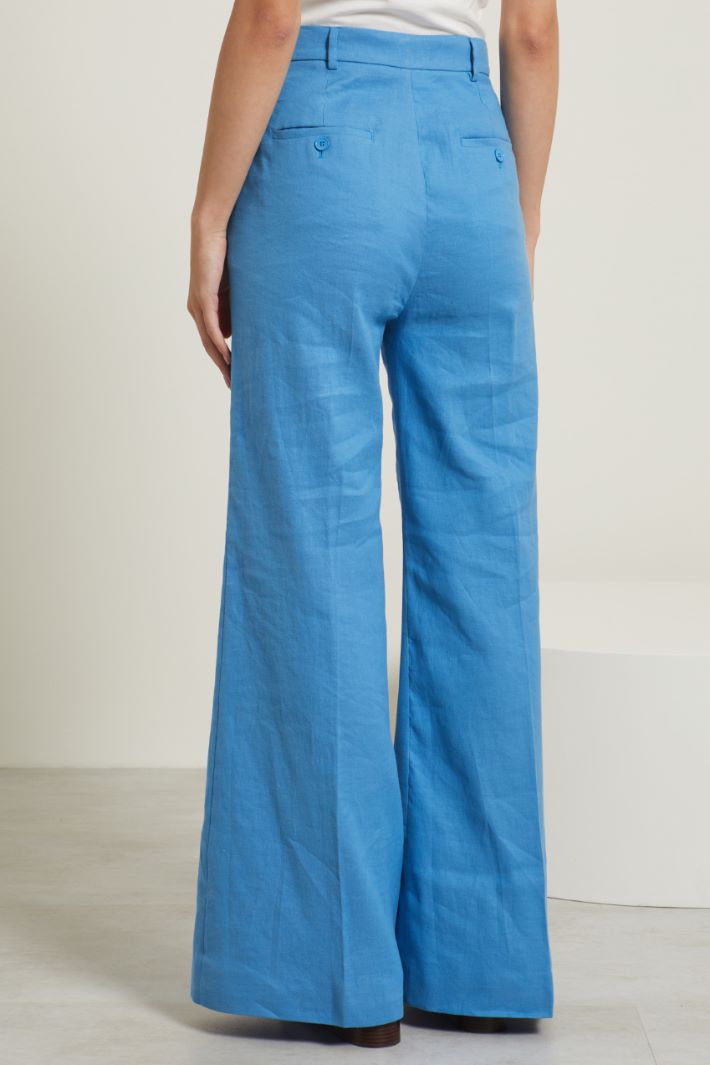 Pantaloni a zampa con piega Fashion Market