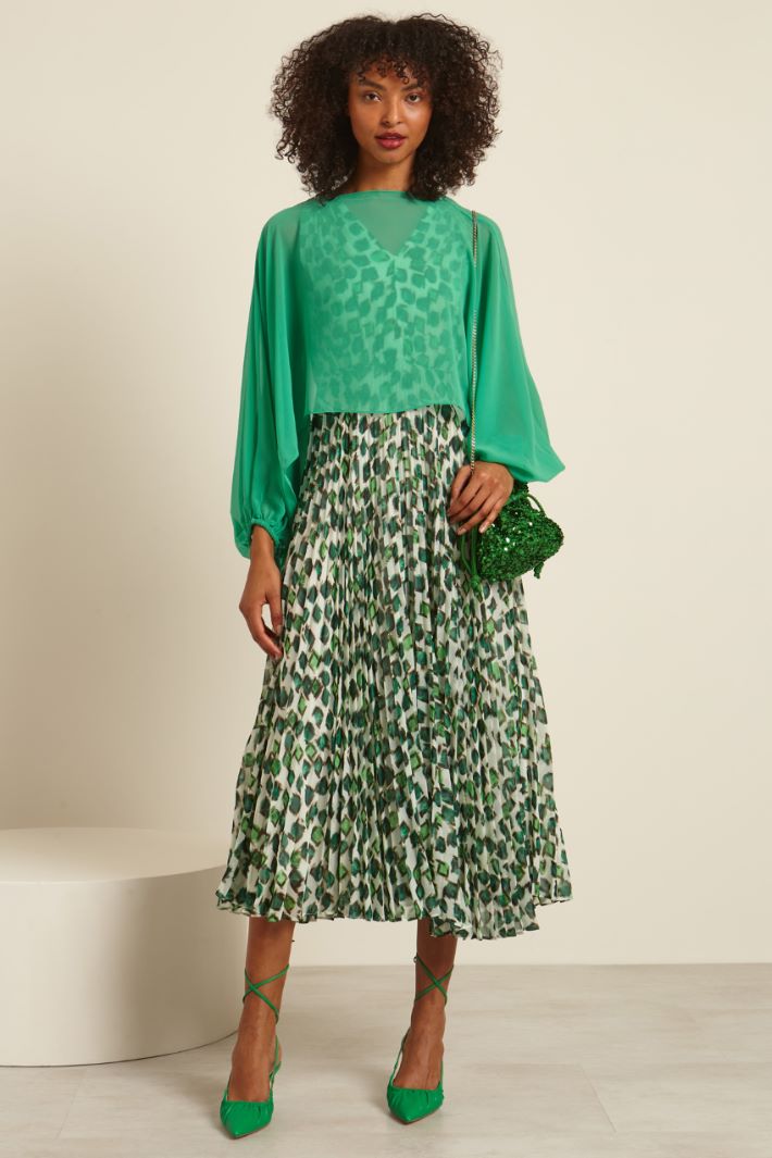 Abito smanicato plissè Fashion Market