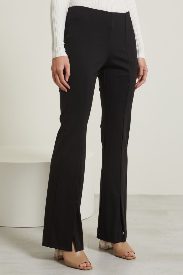 Pantaloni flare con spacchi Fashion Market