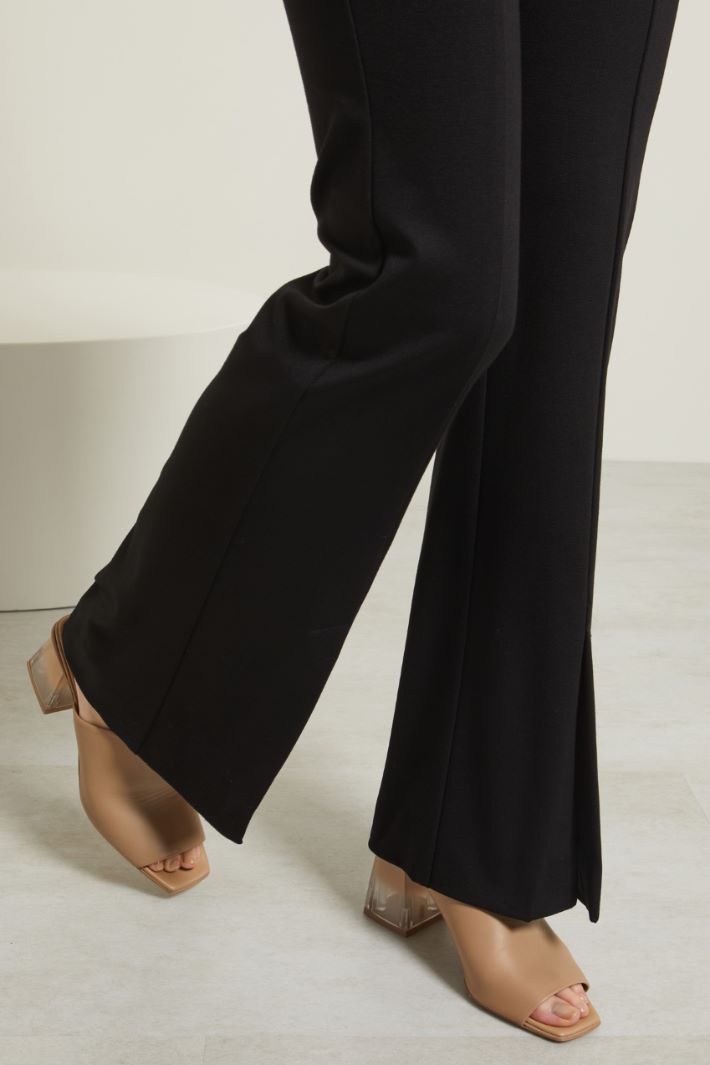 Pantaloni flare con spacchi Fashion Market