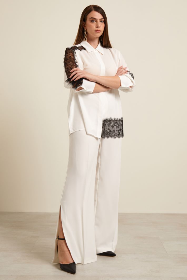 Pantaloni a palazzo con spacchi Fashion Market