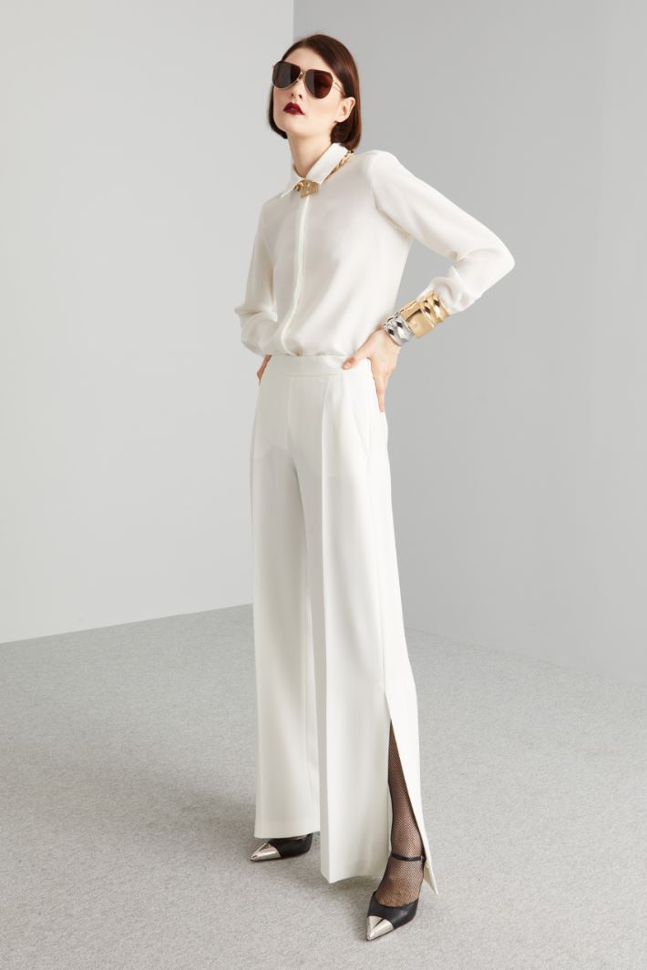 Pantaloni con spacchi al fondo - BIANCO - Fashion Market